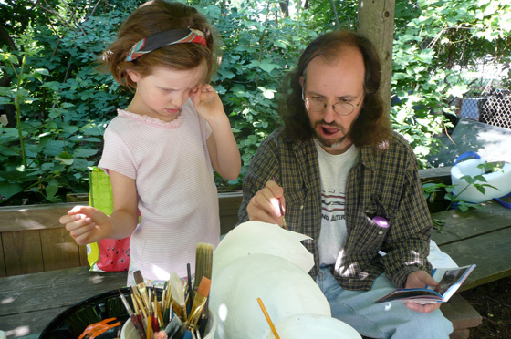 Painting the owl mask.